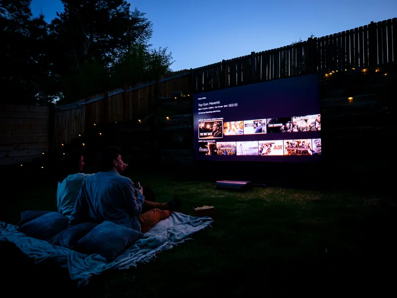 Open-air cinema seating under the night sky