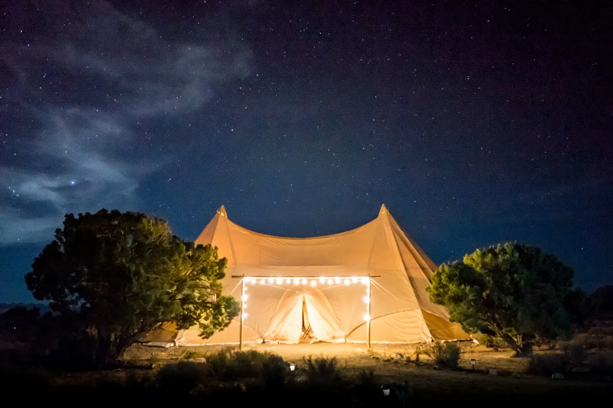 Canvas tents under a starlit sky at Under-Sky Rooms