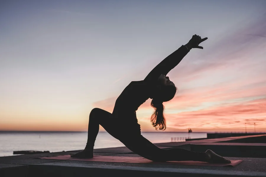 Full-moon yoga session outdoors